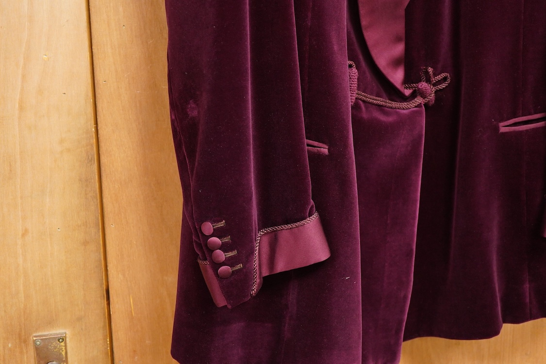 The property of a titled gentleman: A Redwood & Feller maroon velvet mid 20th century gentleman’s smoking jacket, with maroon silk cuff and collar detail, front chest 56cm.